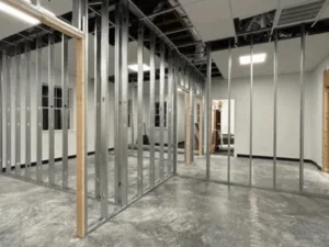 Metal frame installation for office space partition